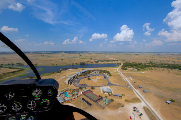 Helicopter landing at Rough Creek Lodge